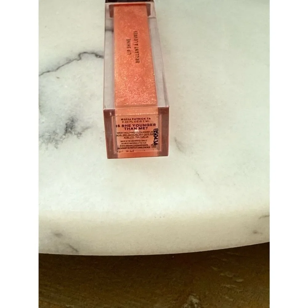 PATRICK TA Major Glow Lip Shine in Is She Younger Than Me